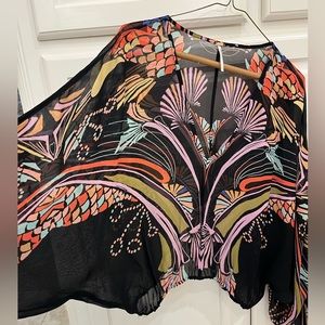 Beautiful free people too. Barely worn. Wear to work or out in the evening.